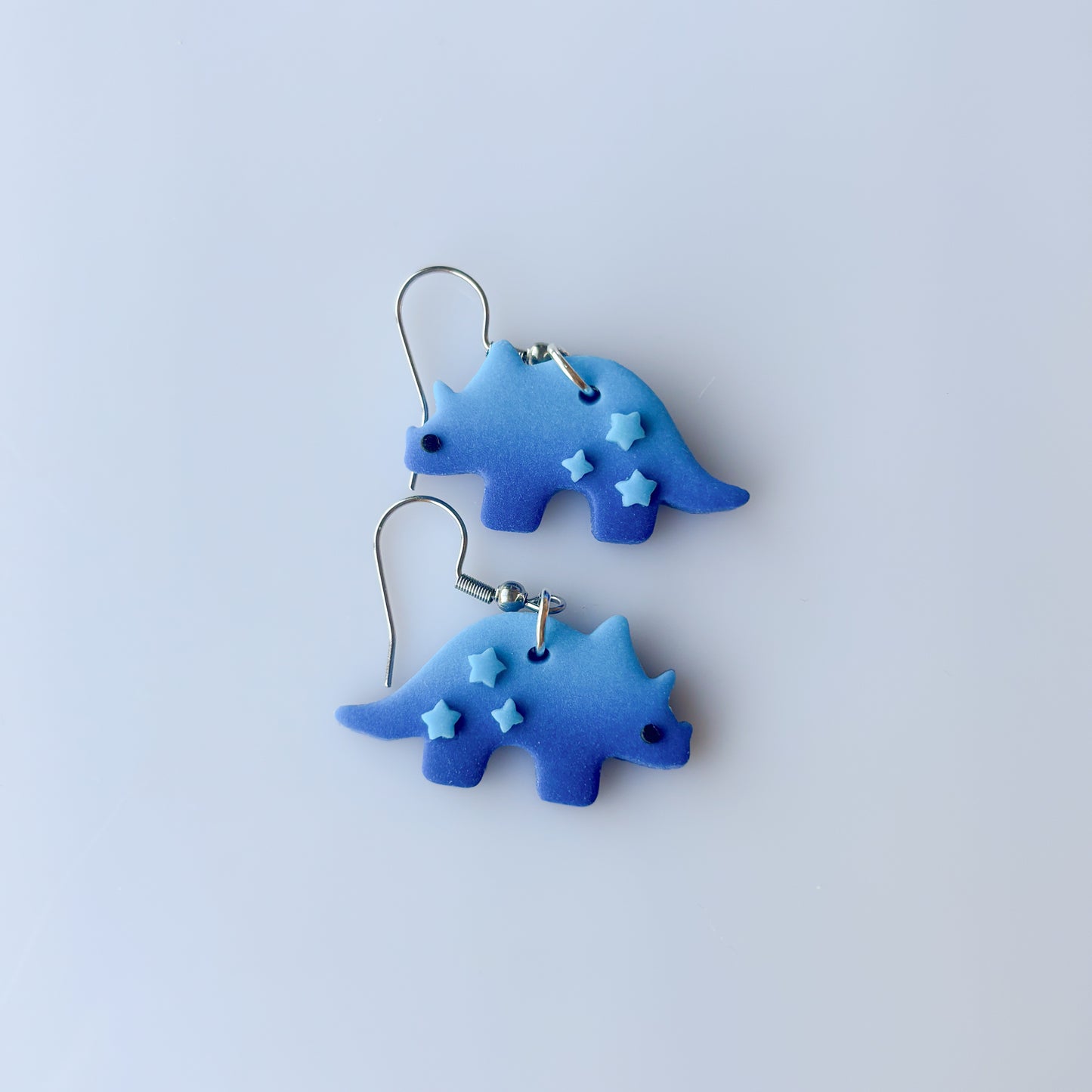 BLUE OMBRE DINO EARRINGS (TRICERATOPS)