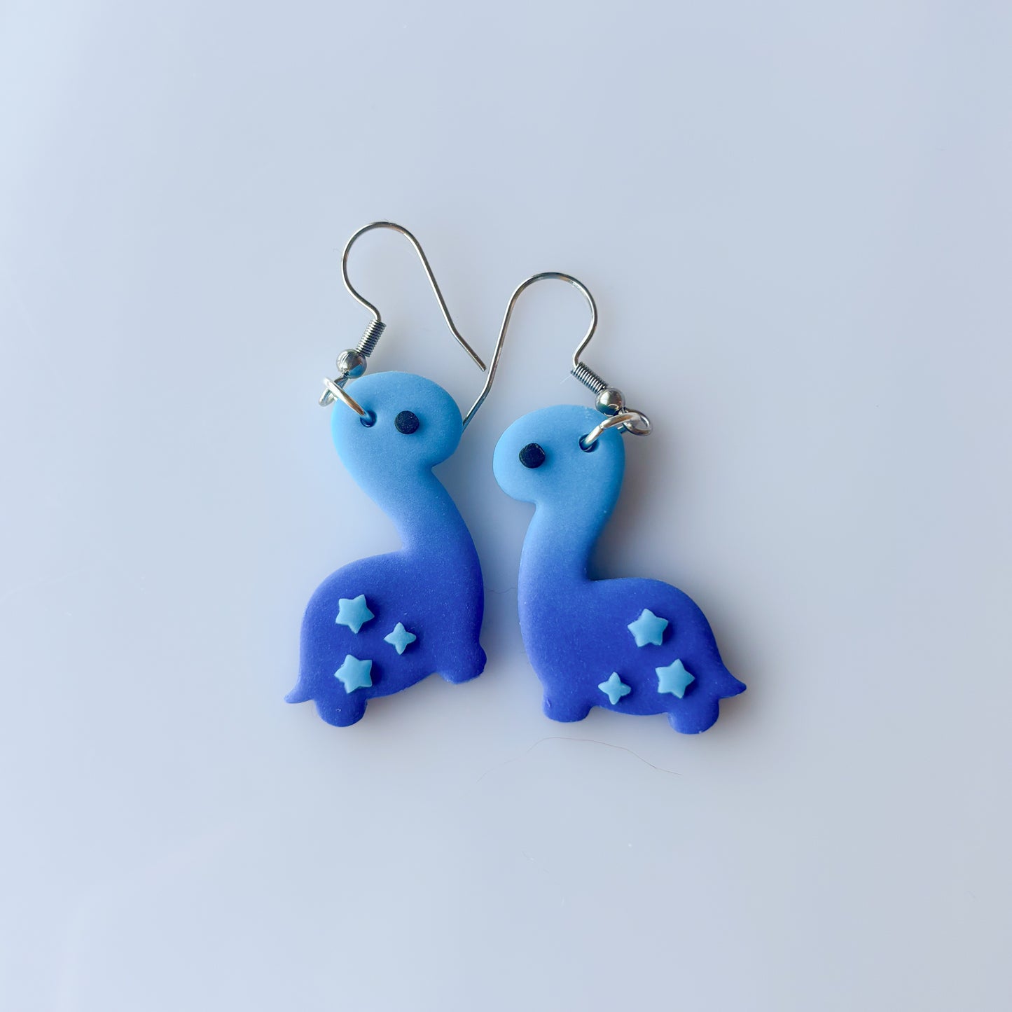 BLUE OMBRE DINO EARRINGS (BRONTO)