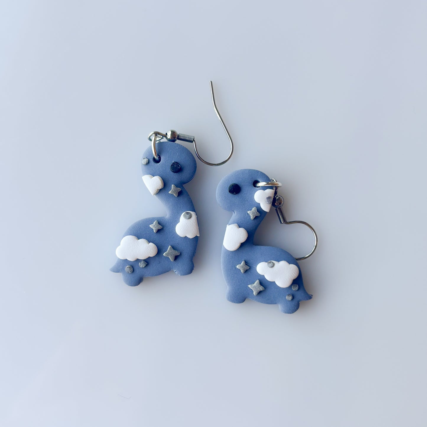 CLOUDY DINO EARRINGS (BRONTO)