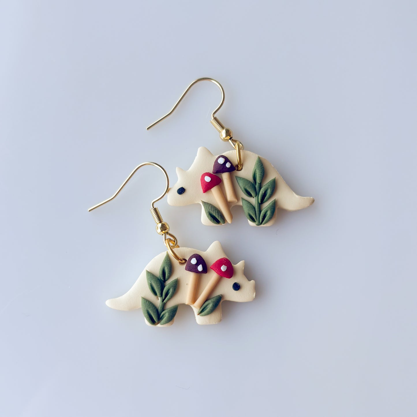 RED MUSHROOM DINO EARRINGS (TRICERATOPS)