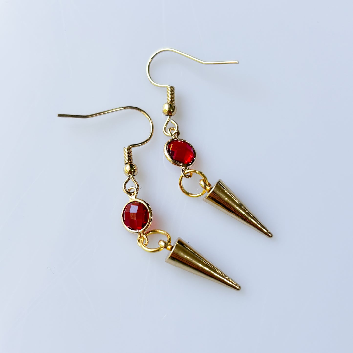 RED GEM & GOLD SPIKE CHARM EARRINGS