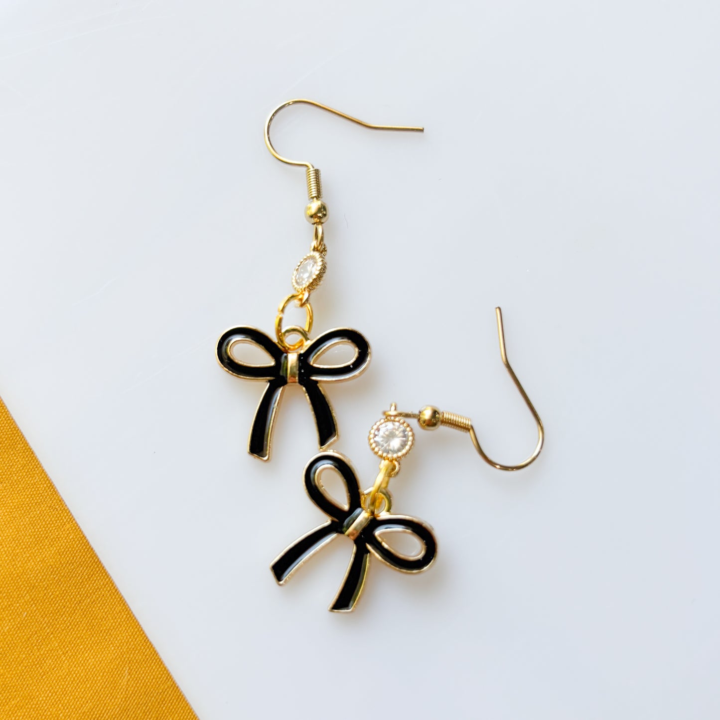 BLACK BOW CHARM EARRINGS