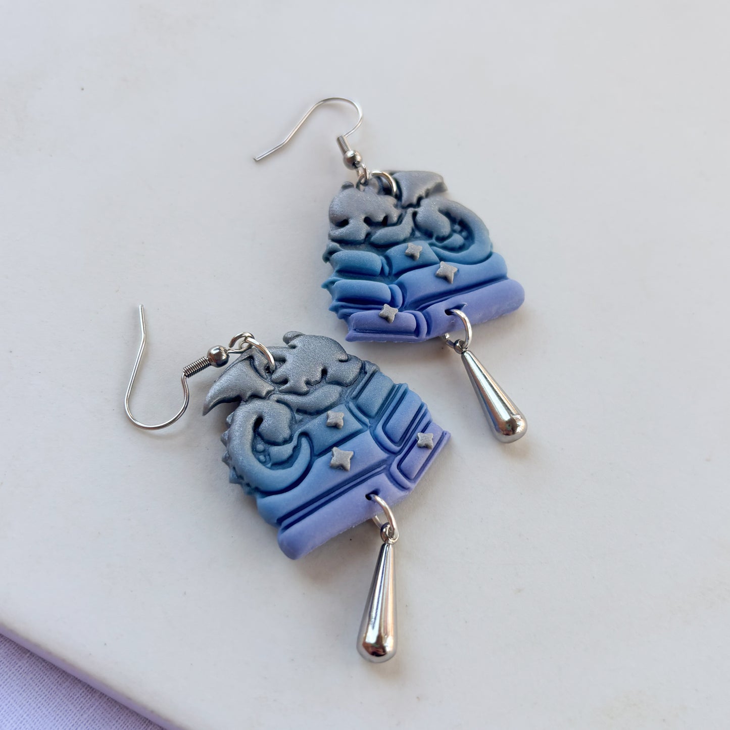 DRAGON ON BOOKS EARRINGS (SILVER BLUE PERIWINKLE)