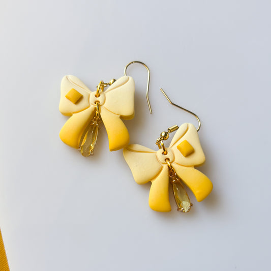 BUTTER BOW EARRINGS