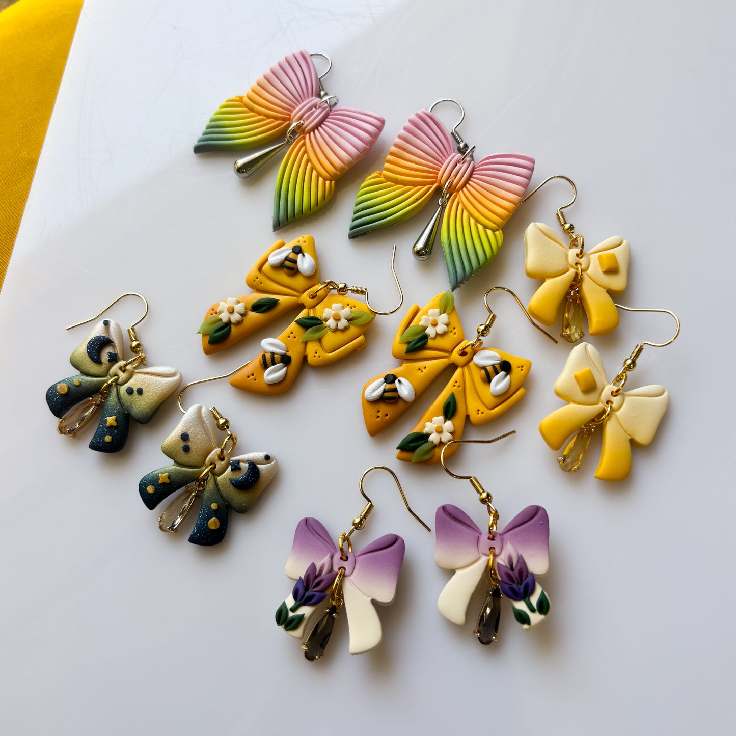 STARRY BOW EARRINGS