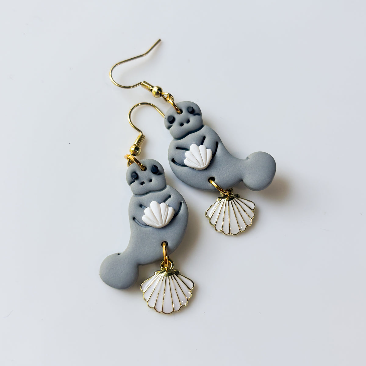 MANATEES (WITH WHITE SHELLS) EARRINGS