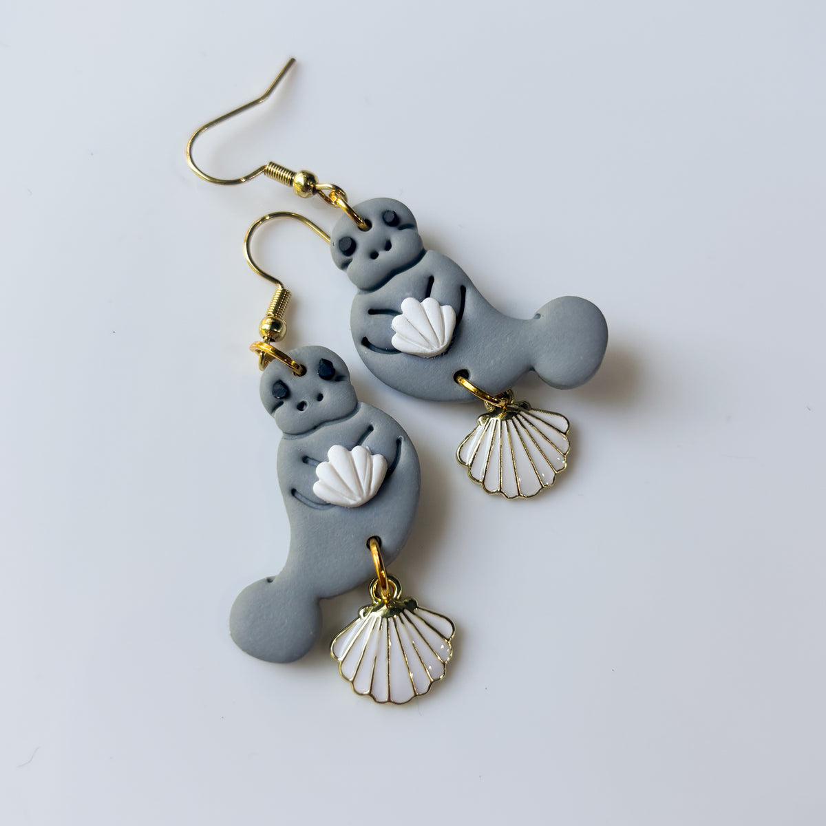 MANATEES (WITH WHITE SHELLS) EARRINGS