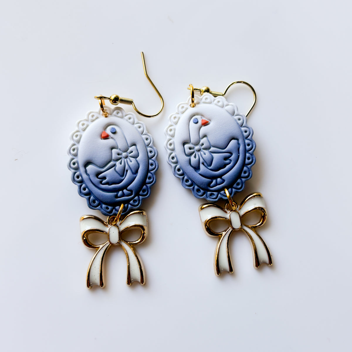 SILLY GOOSE FRAME EARRINGS