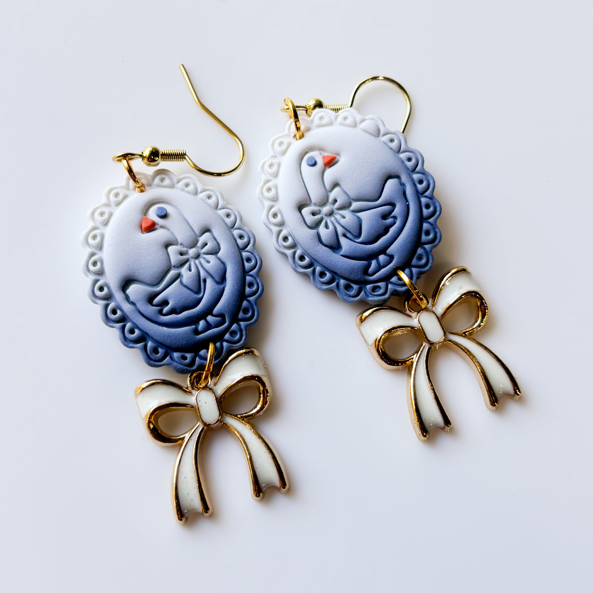 SILLY GOOSE FRAME EARRINGS