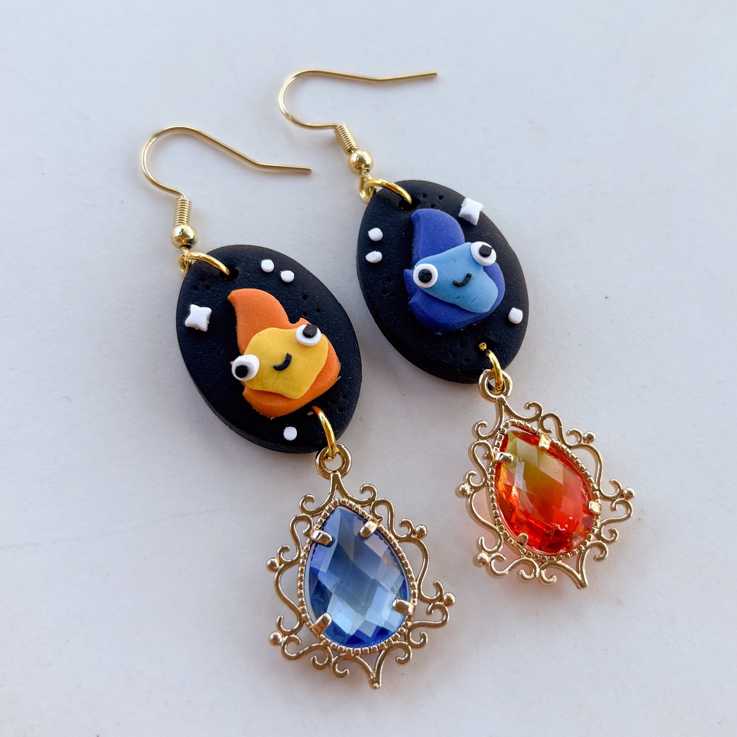 MISMATCHED FLAME SPIRIT OVAL EARRINGS