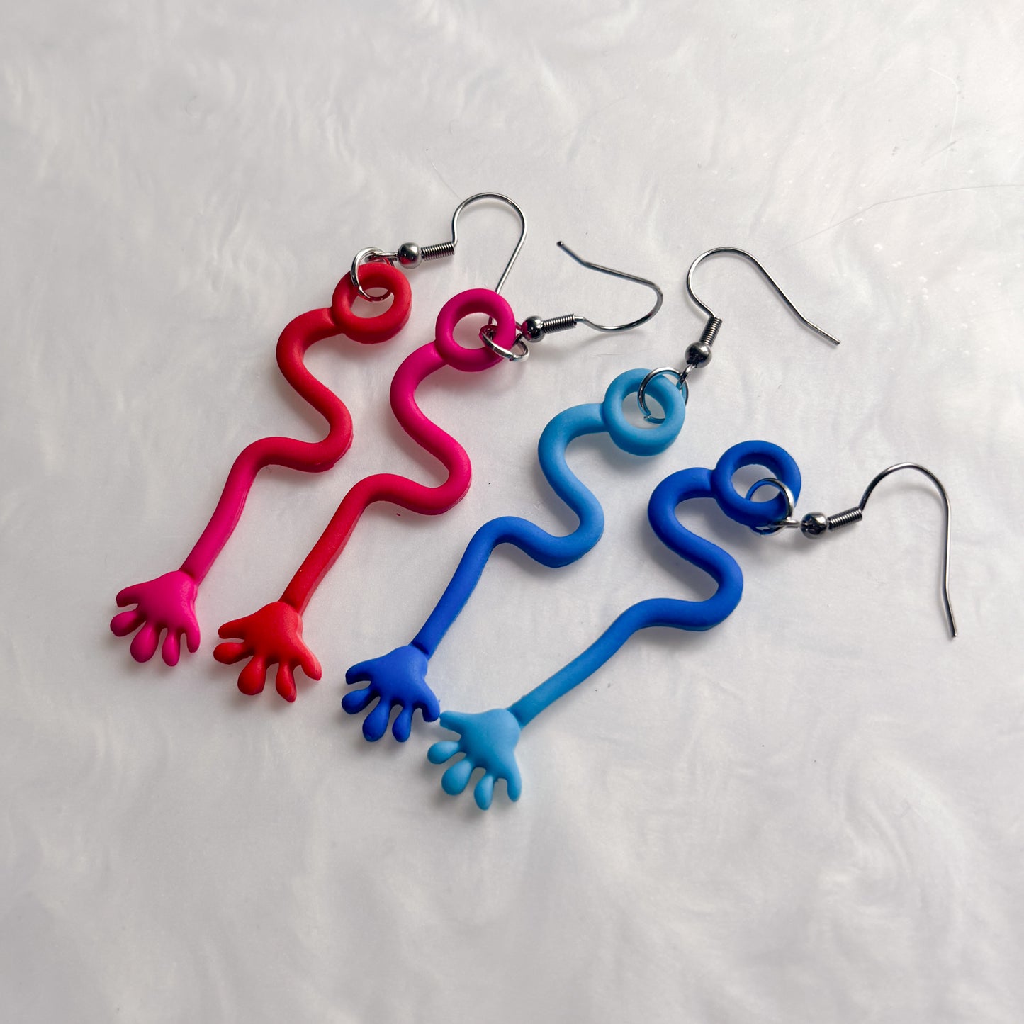 BLUE STICKY HAND EARRINGS