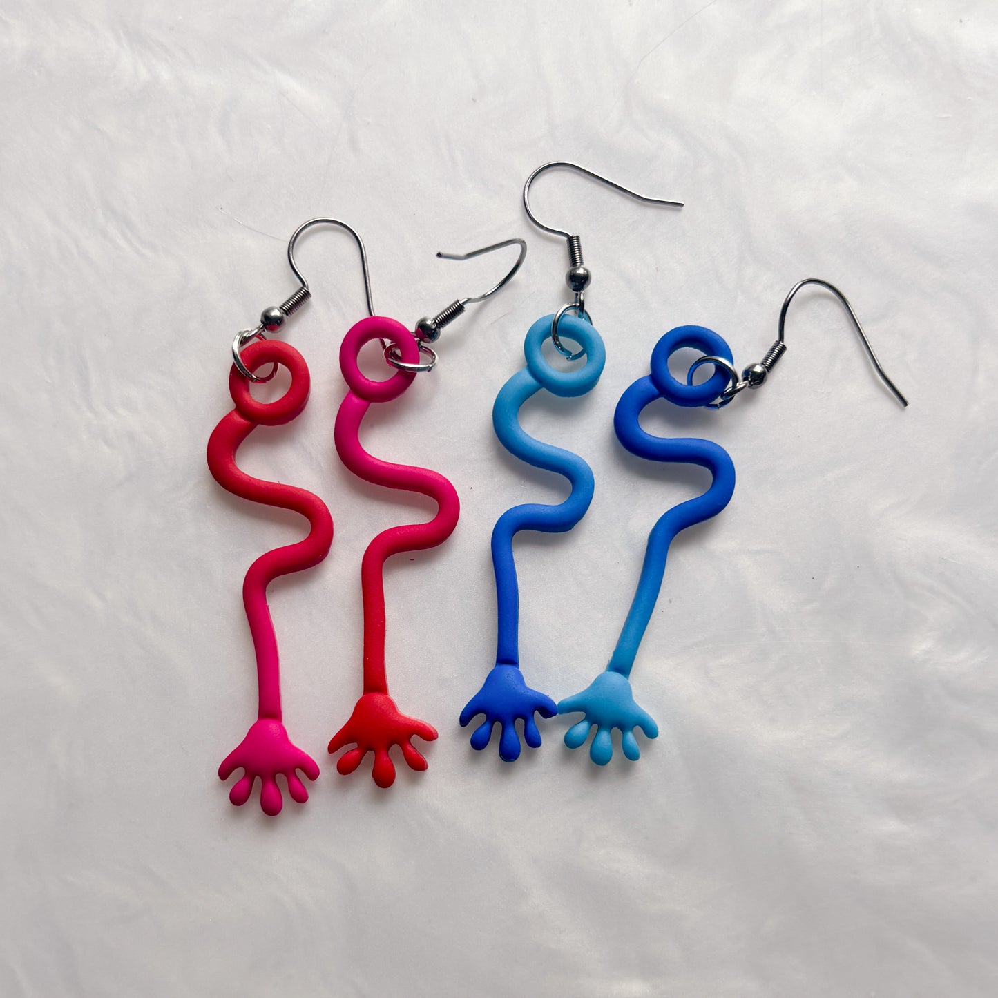 PINK/RED STICKY HAND EARRINGS