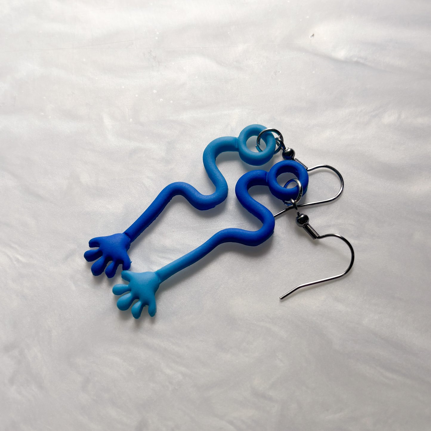 BLUE STICKY HAND EARRINGS