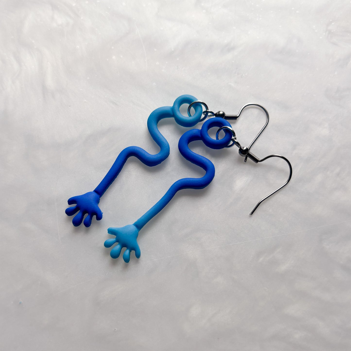 BLUE STICKY HAND EARRINGS