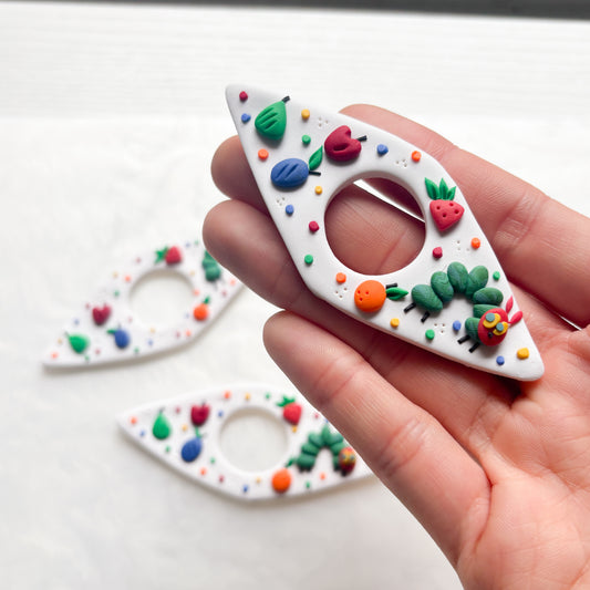 HUNGRY CATERPILLAR PAGE HOLDER