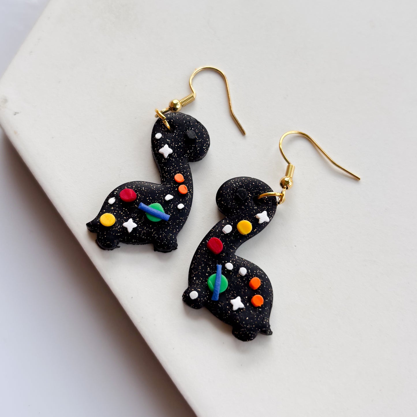 SPACE DINO EARRINGS