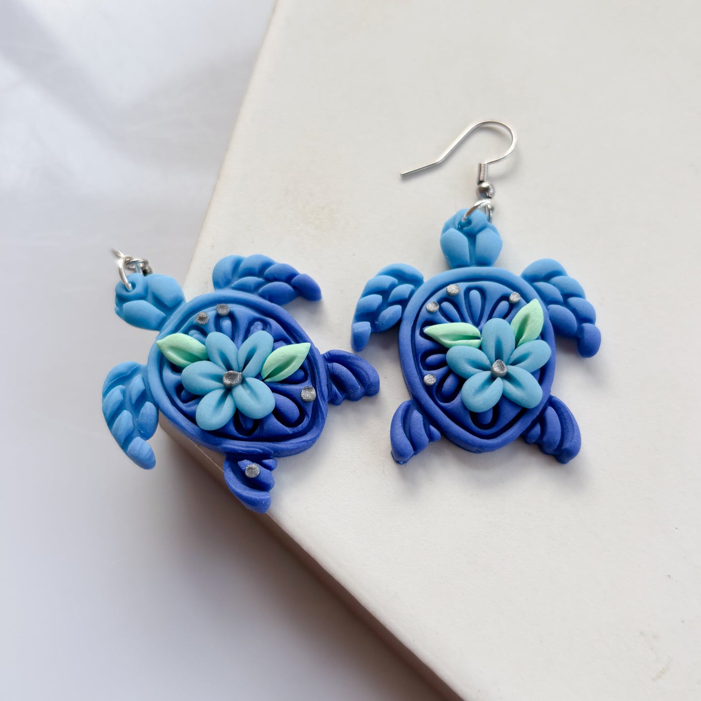 BLUE FLOWER TURTLE EARRINGS