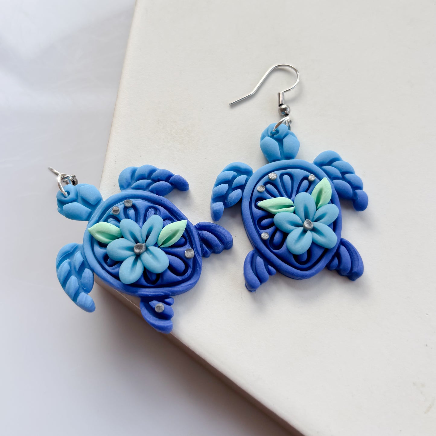 BLUE FLOWER TURTLE EARRINGS