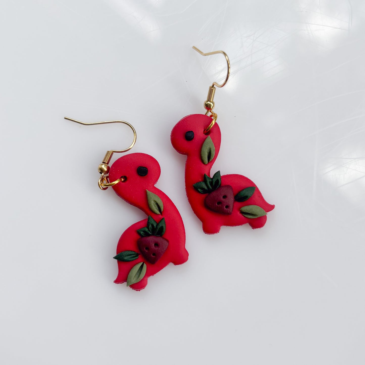 RED STRAWBERRY DINO EARRINGS (BRONTO)