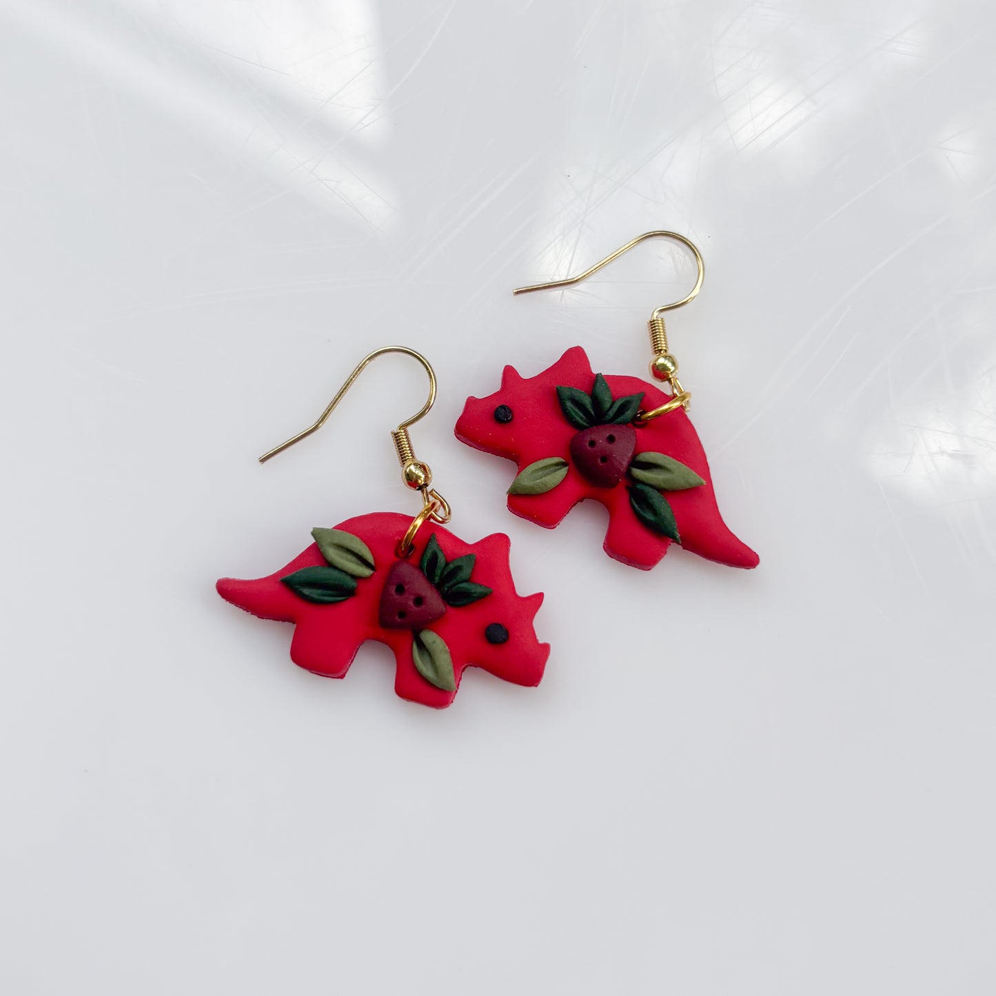 RED STRAWBERRY DINO EARRINGS (TRICERATOPS)