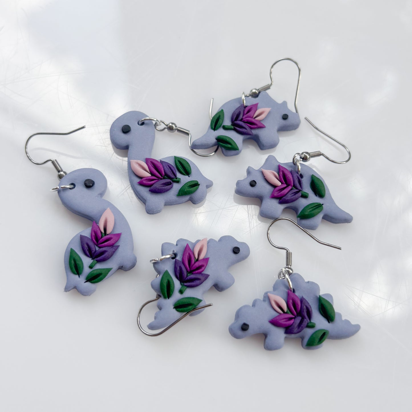 LAVENDER DINO EARRINGS (TRICERATOPS)