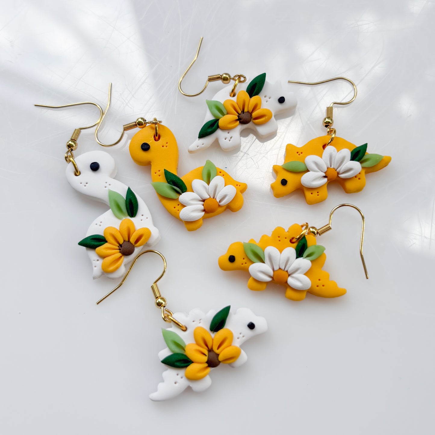 MISMATCHED DAISY SUNFLOWER DINO EARRINGS (STEGO)