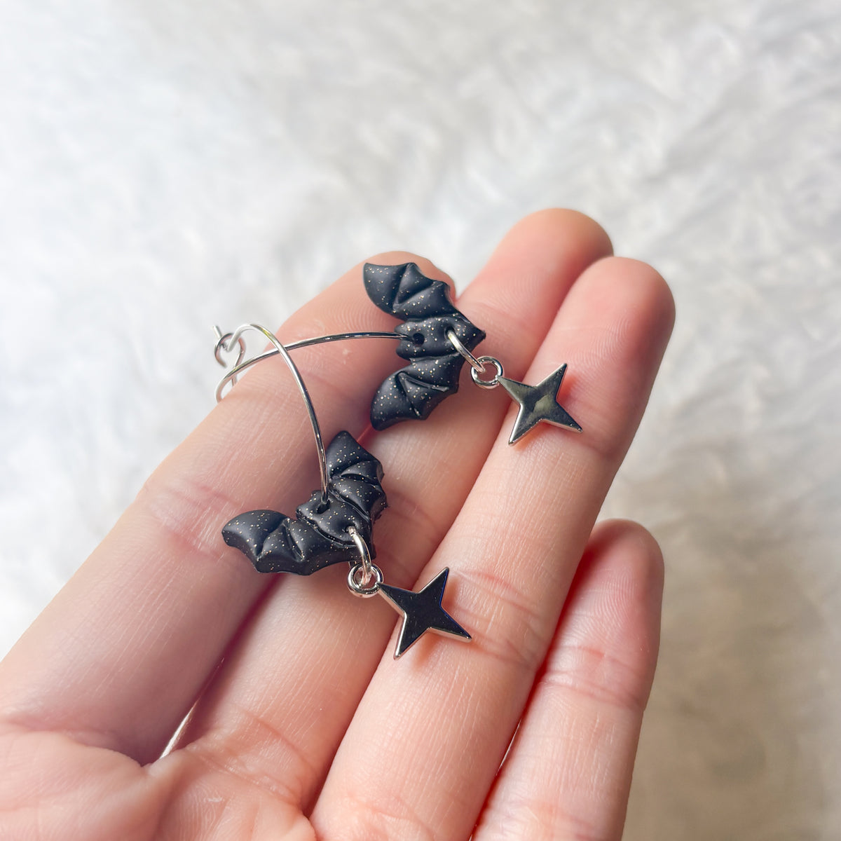 TINY BAT HOOP EARRINGS