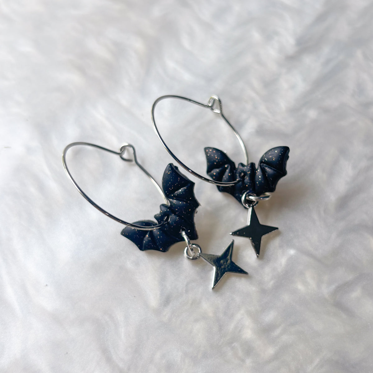 TINY BAT HOOP EARRINGS