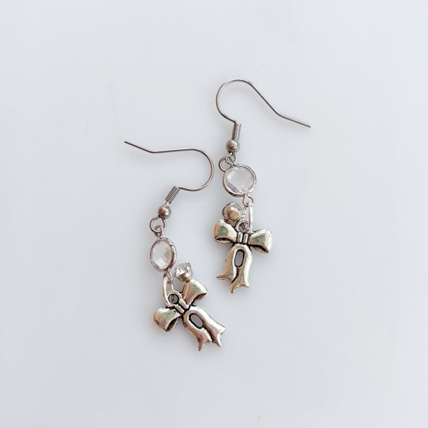 LITTLE SILVER BOW CHARM EARRINGS