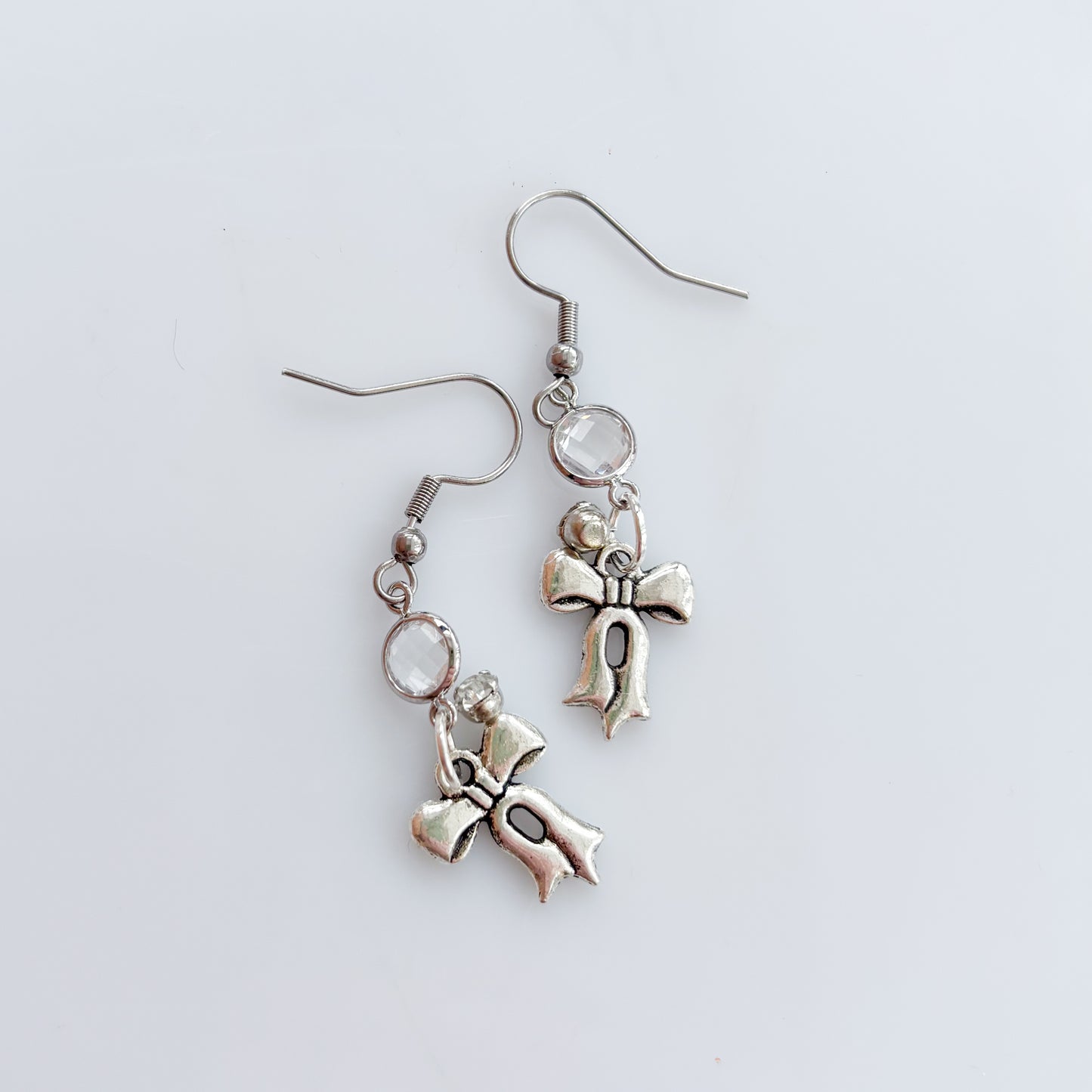 LITTLE SILVER BOW CHARM EARRINGS