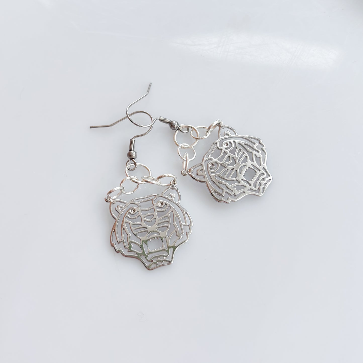 SILVER TIGER CHARM EARRINGS