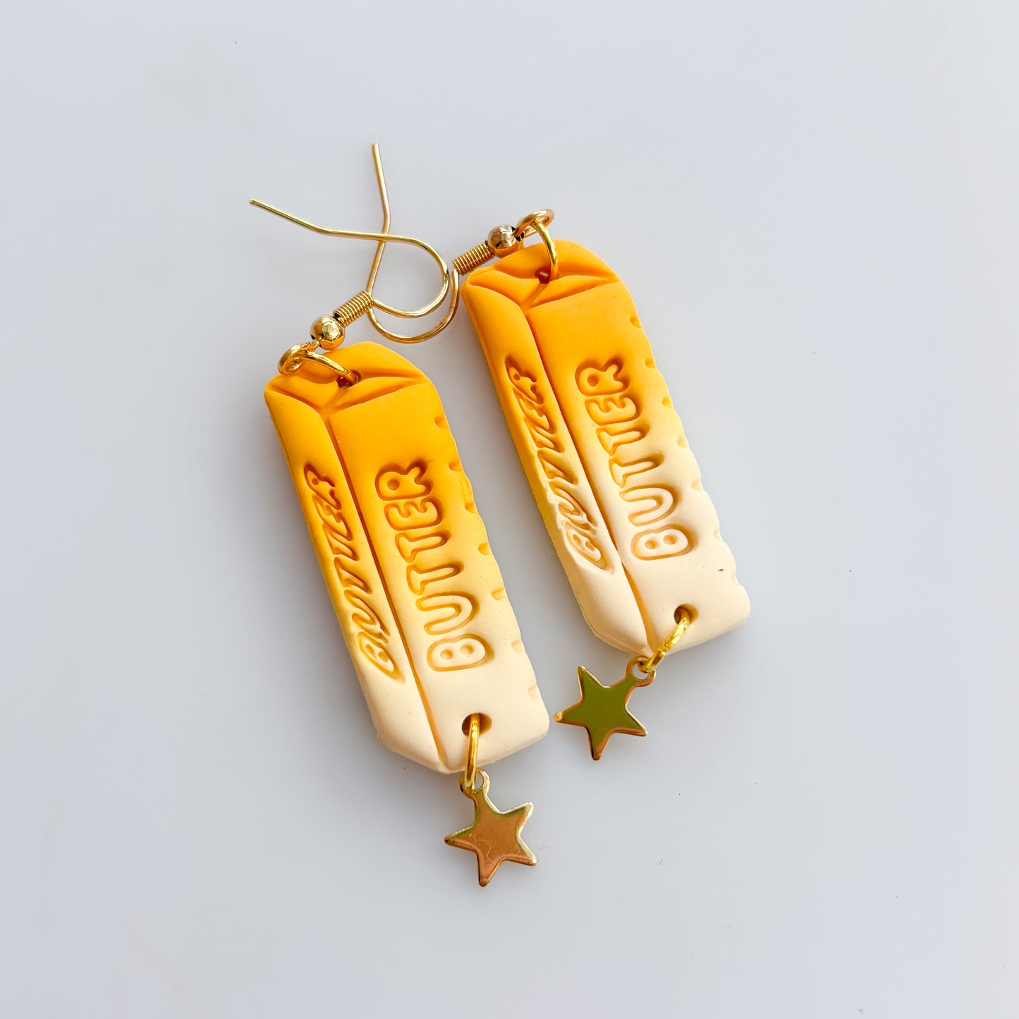 BUTTER STICK EARRINGS