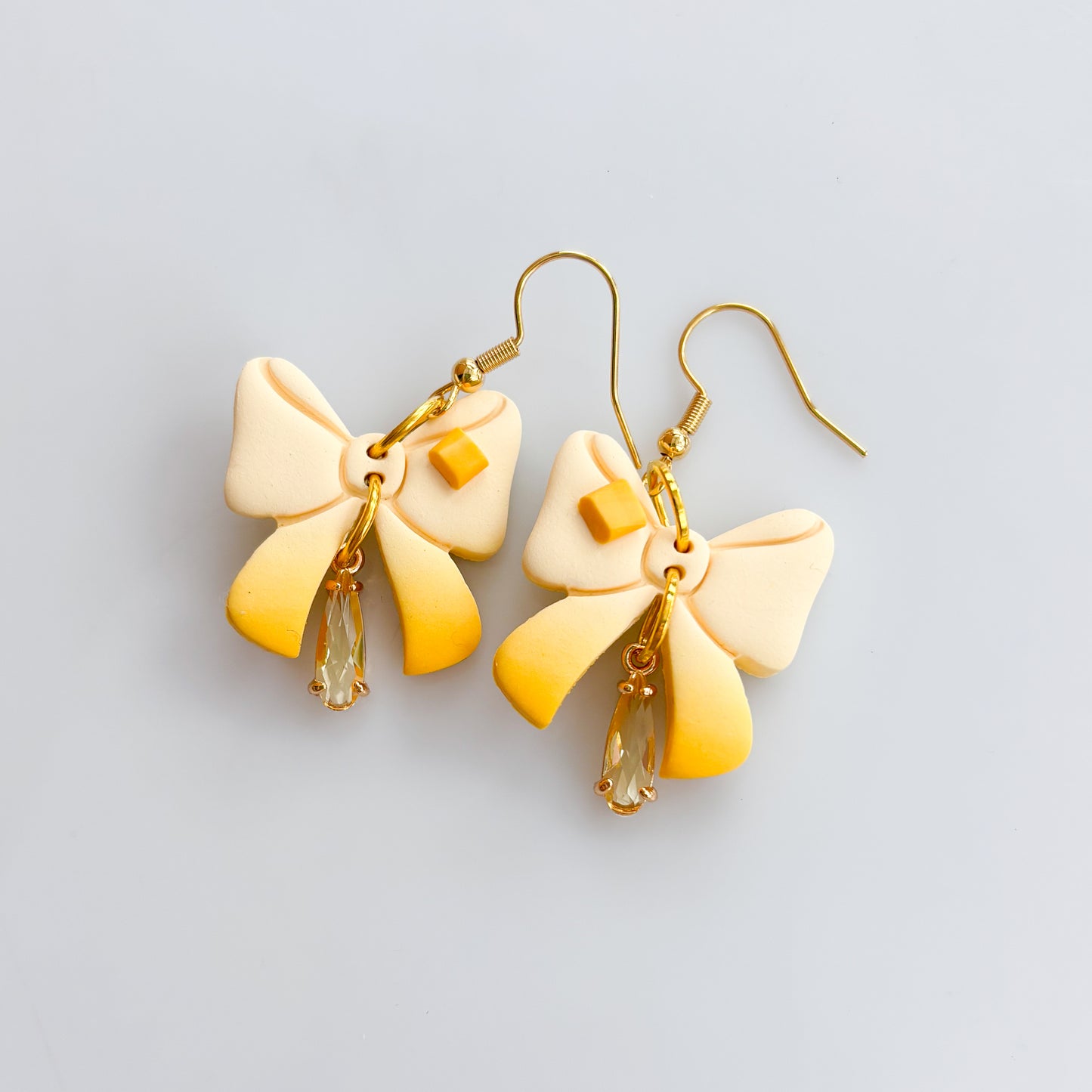 BUTTER BOW EARRINGS