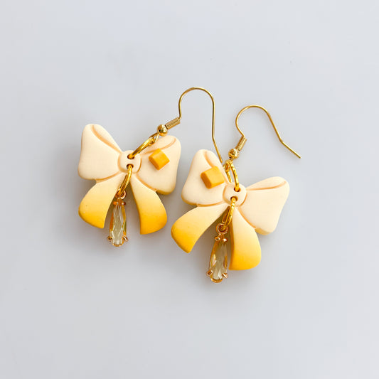 BUTTER BOW EARRINGS