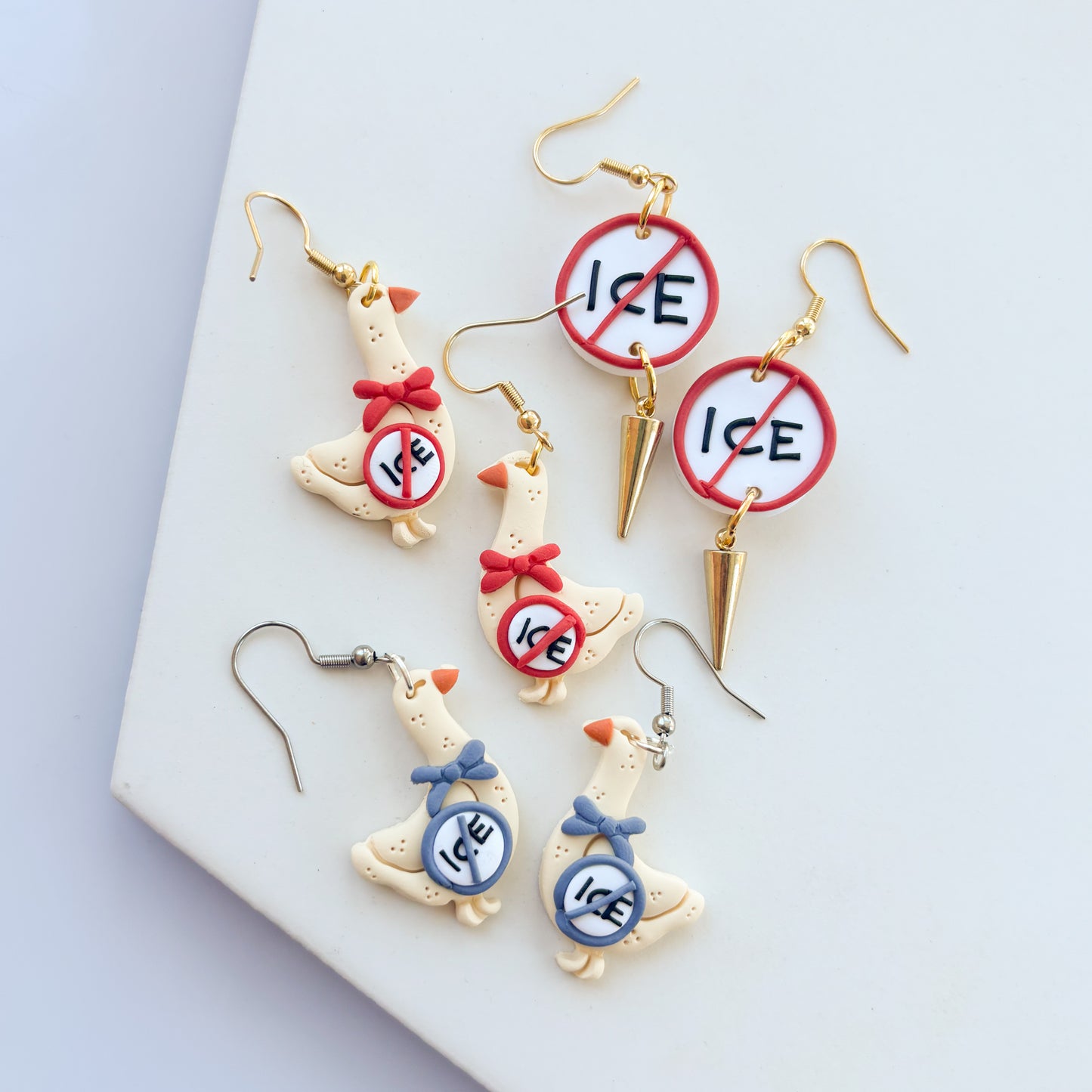 'ICE OUT' GEESE EARRINGS (BLUE)