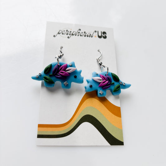 BLUE LAVENDER TRICERATOPS DINO EARRINGS