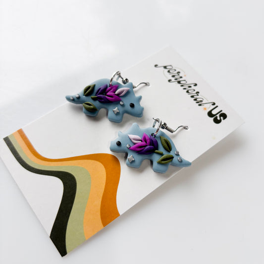 DUSTY BLUE LAVENDER TRICERATOPS DINO EARRINGS
