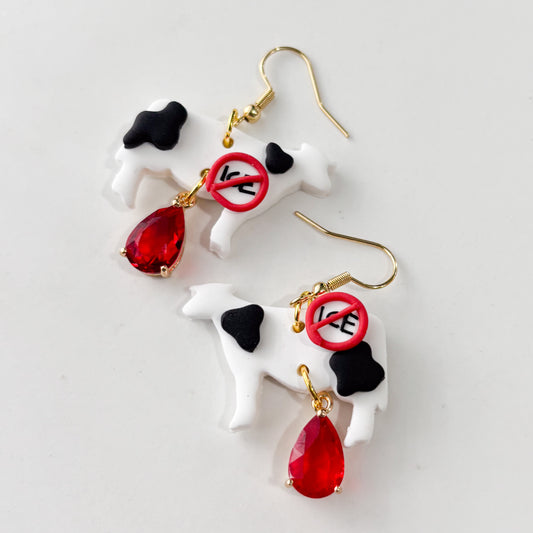 ICE OUT COW EARRINGS