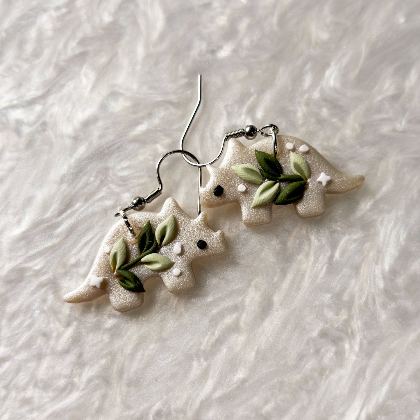 CELESTIAL VINE DINO EARRINGS (TRICERATOPS)
