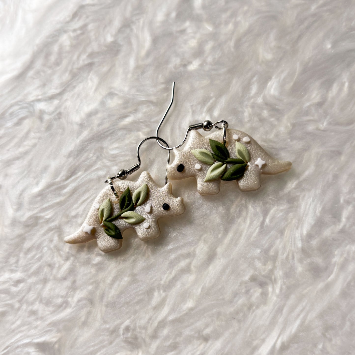 CELESTIAL VINE DINO EARRINGS (TRICERATOPS)