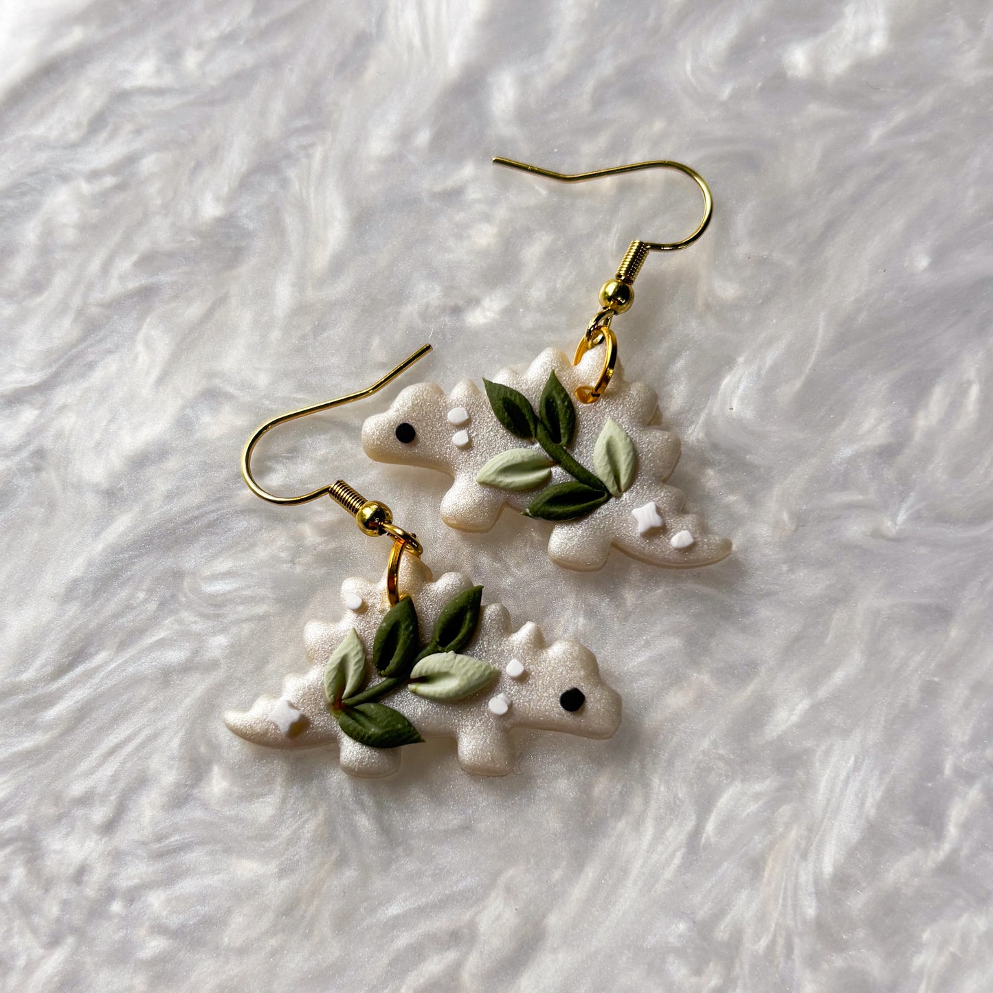 CELESTIAL VINE DINO EARRINGS (STEGOSAURUS)