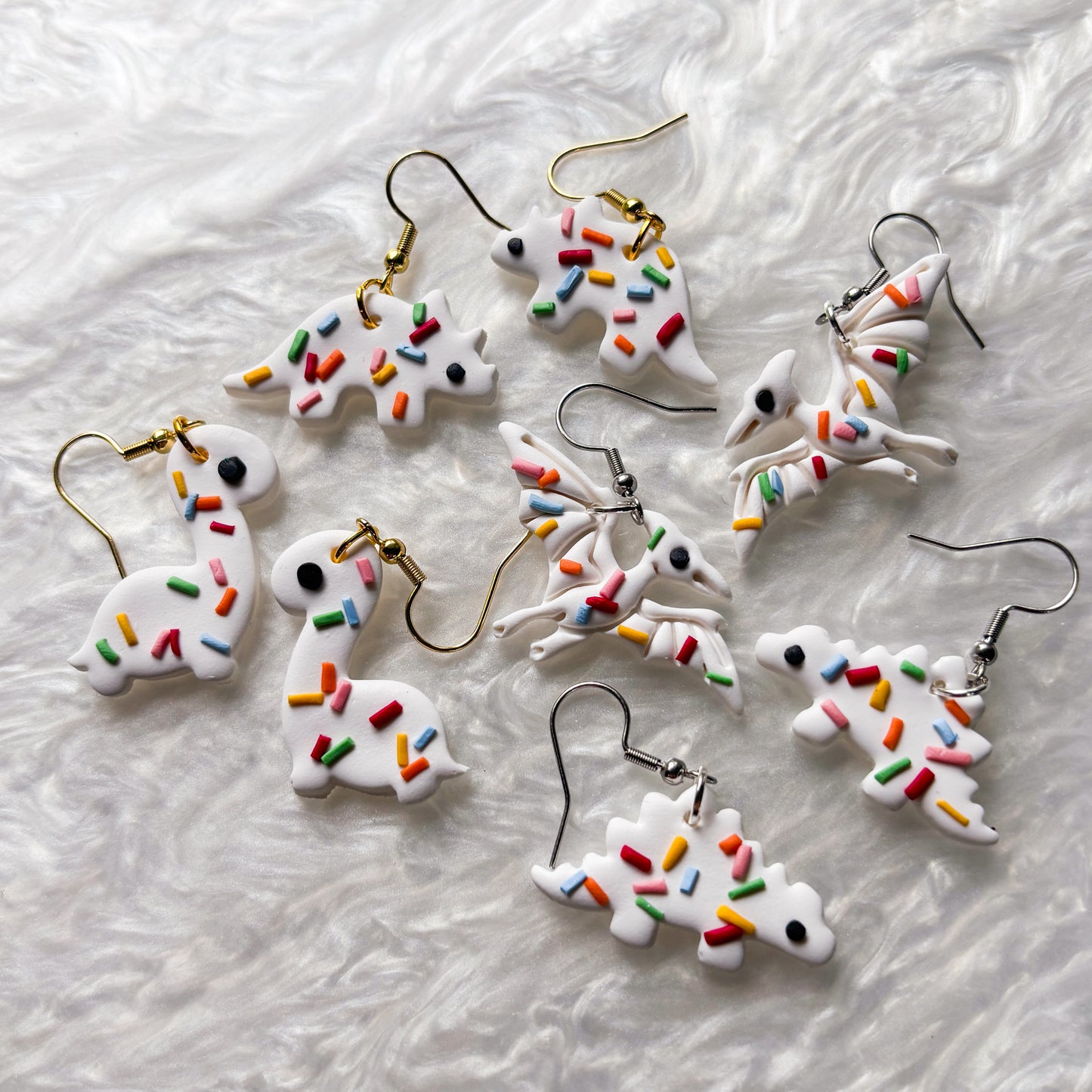 RAINBOW SPRINKLE DINO EARRINGS (BRONTO)