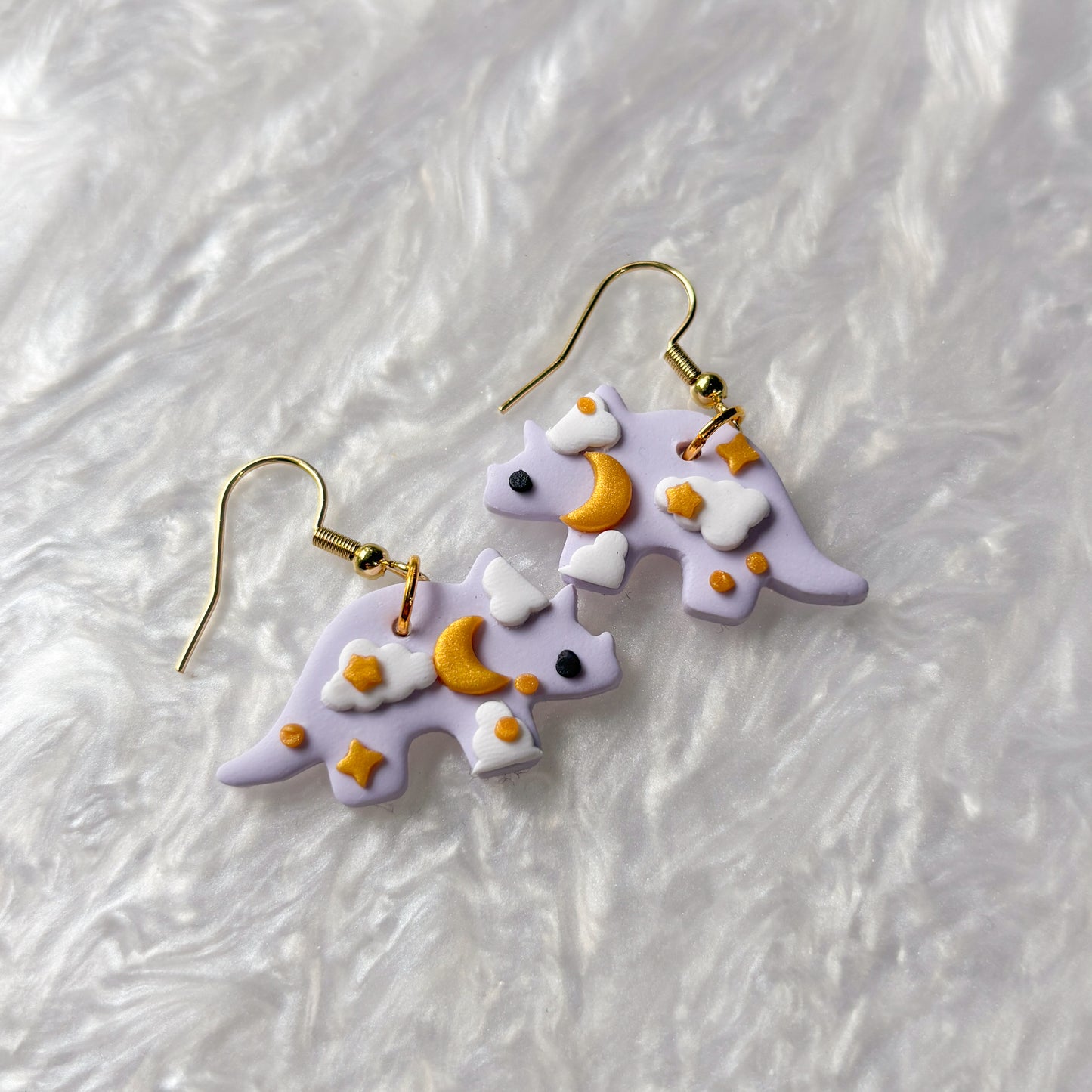 PURPLE CELESTIAL DINO EARRINGS (TRICERATOPS)