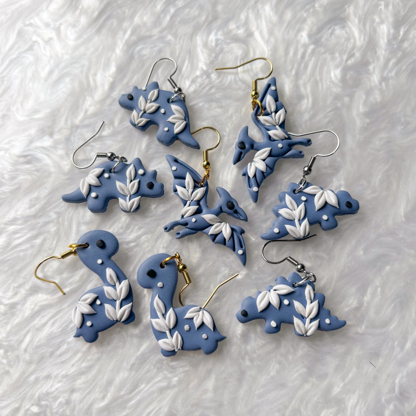 PORCELAIN BLUE DINO EARRINGS (TRICERATOPS)