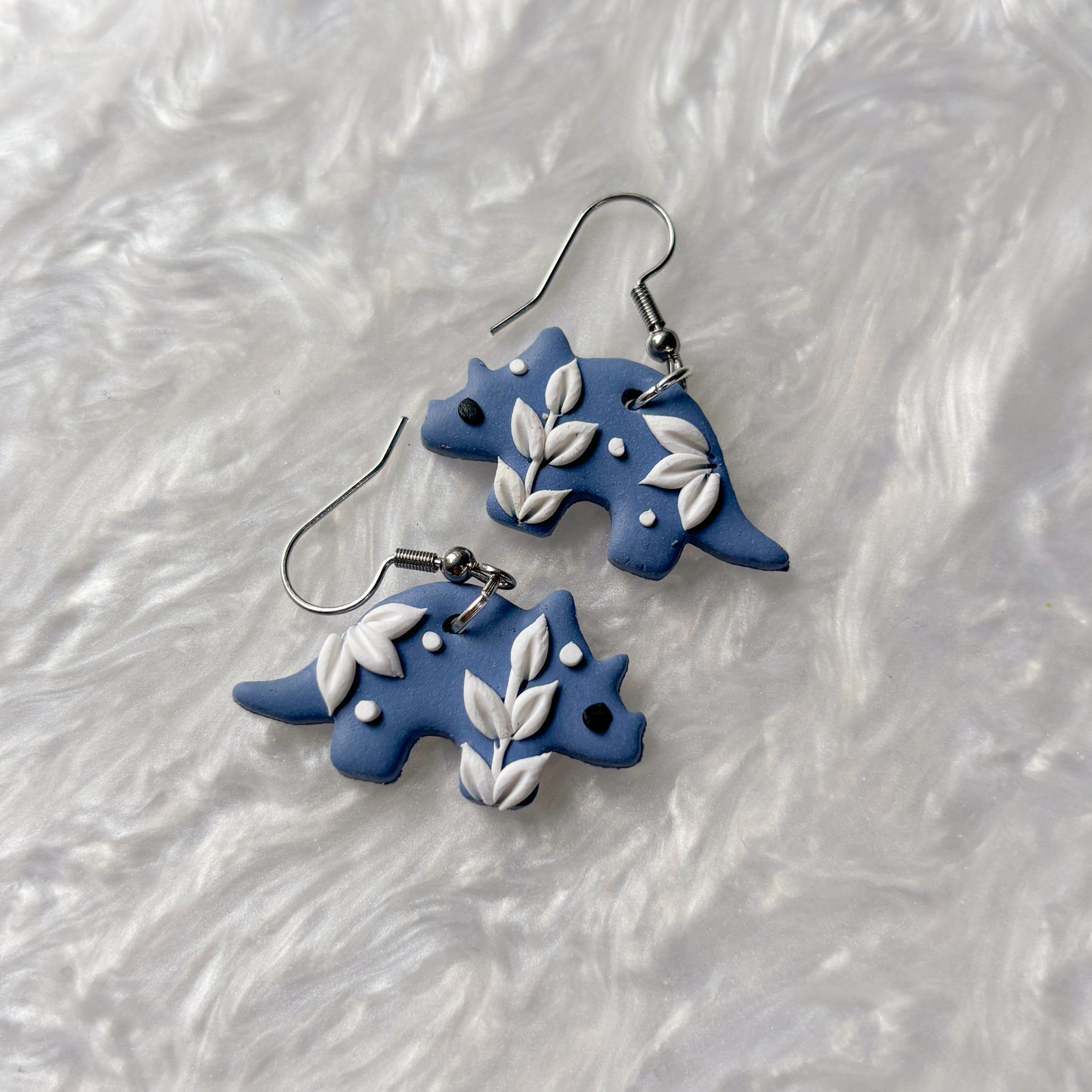PORCELAIN BLUE DINO EARRINGS (TRICERATOPS)
