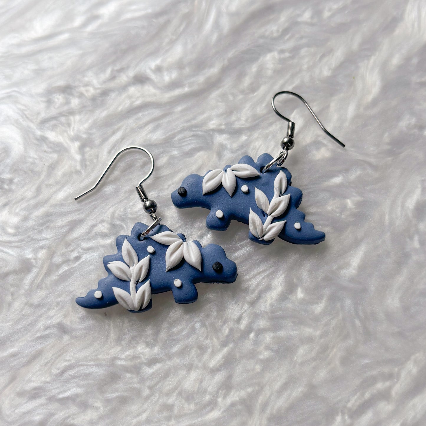 PORCELAIN BLUE DINO EARRINGS (STEGOSAURUS)