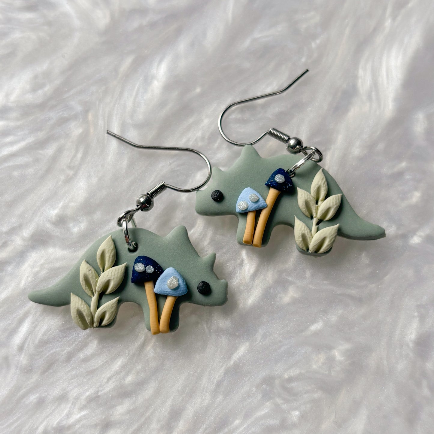 BLUE MUSHROOM DINO EARRINGS (TRICERATOPS)