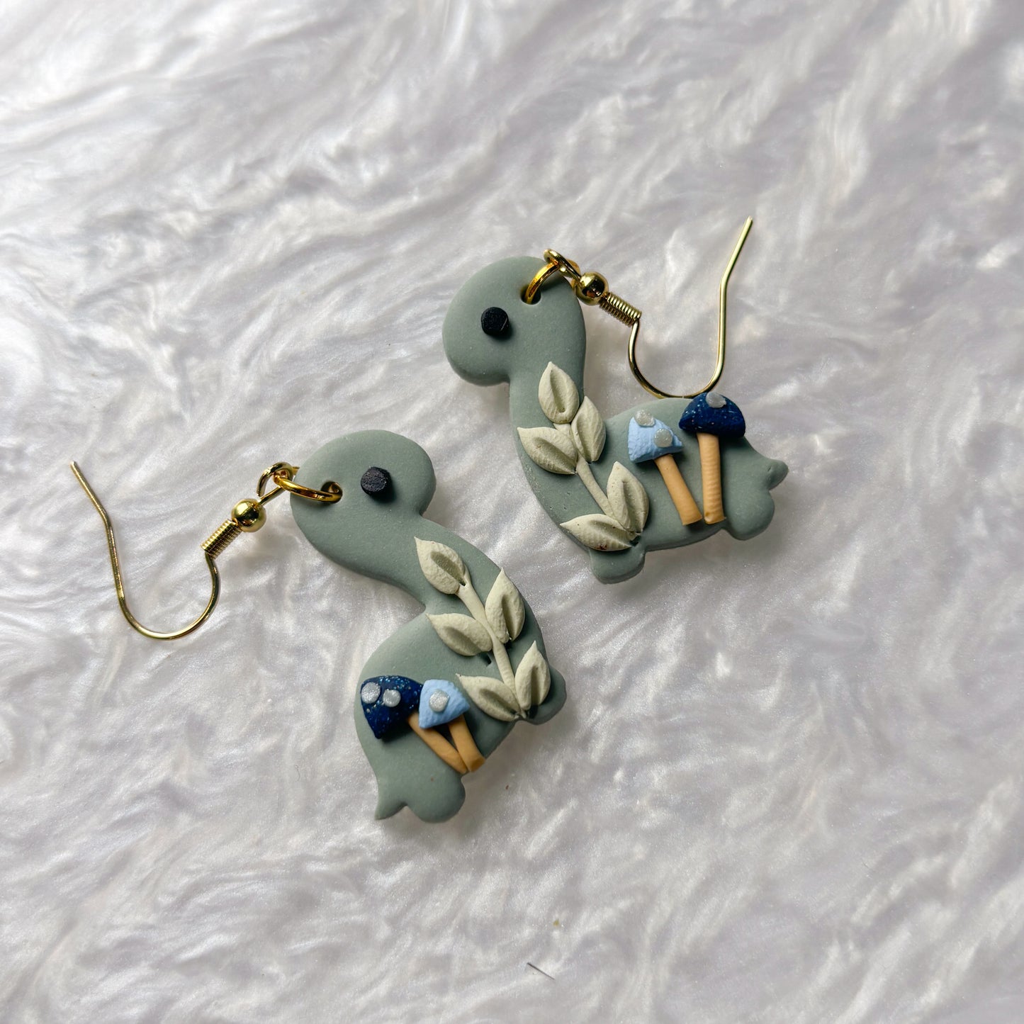 BLUE MUSHROOM DINO EARRINGS (BRONTO)