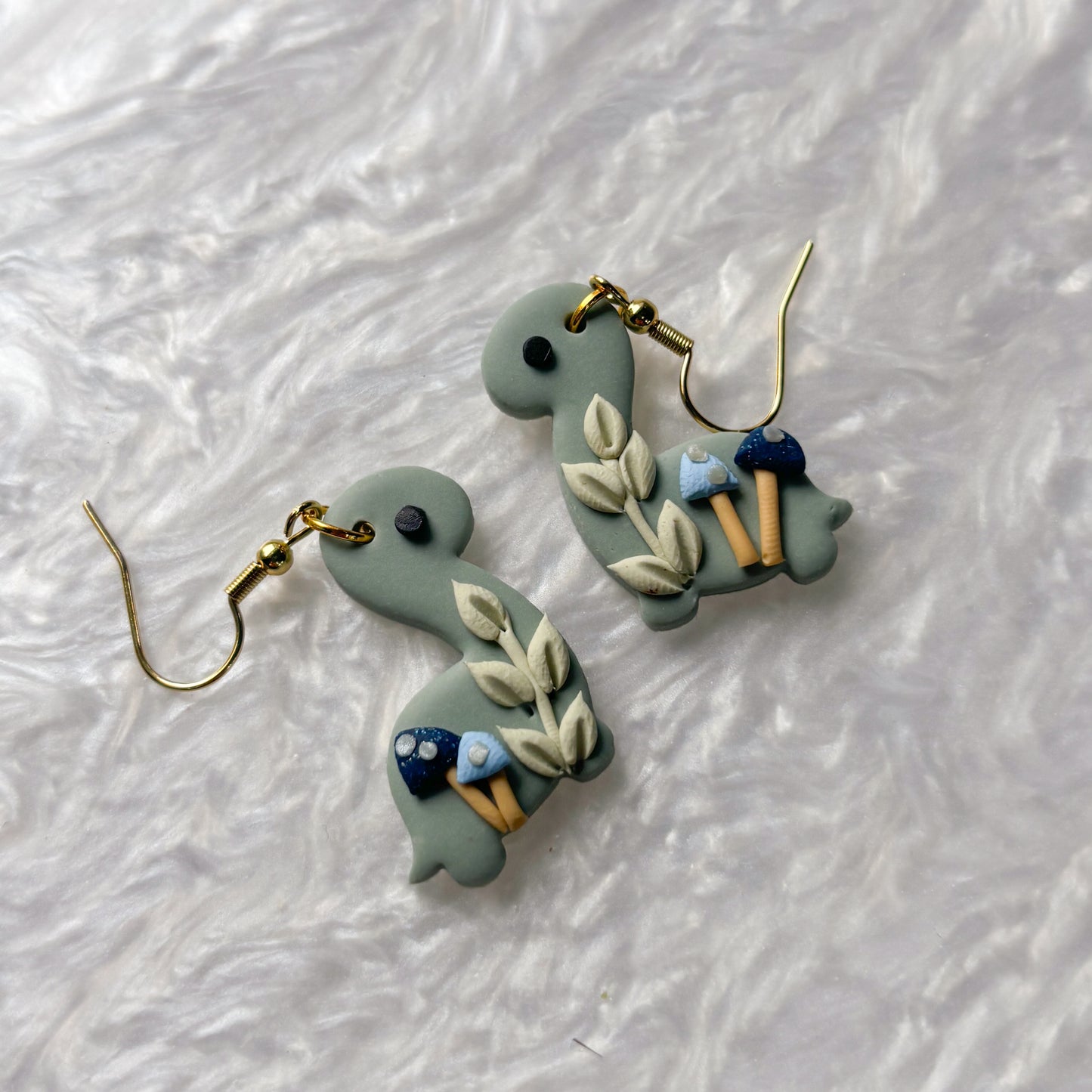 BLUE MUSHROOM DINO EARRINGS (BRONTO)