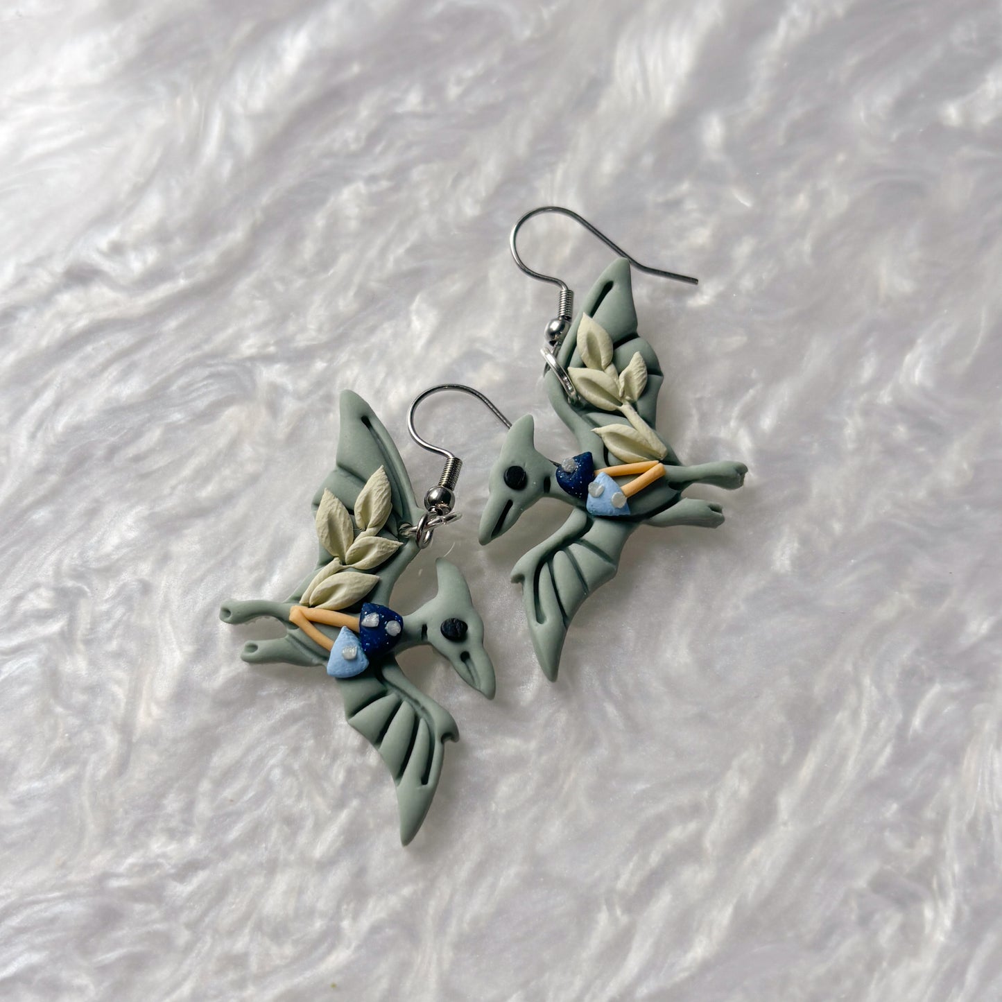 BLUE MUSHROOM DINO EARRINGS (PTERODACTYL)